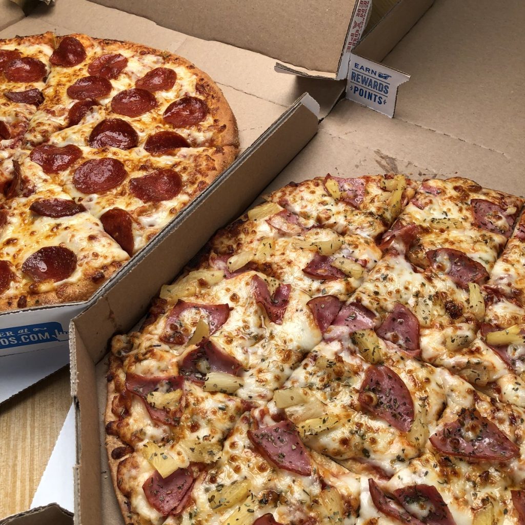 How much does a large pizza cost at Domino's