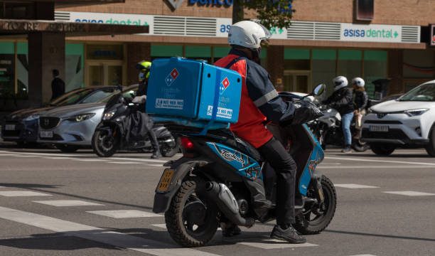 Delivering domino's pizza services