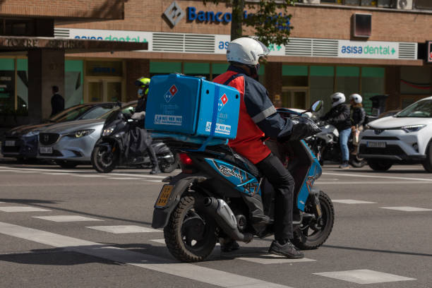 Delivering domino's pizza services